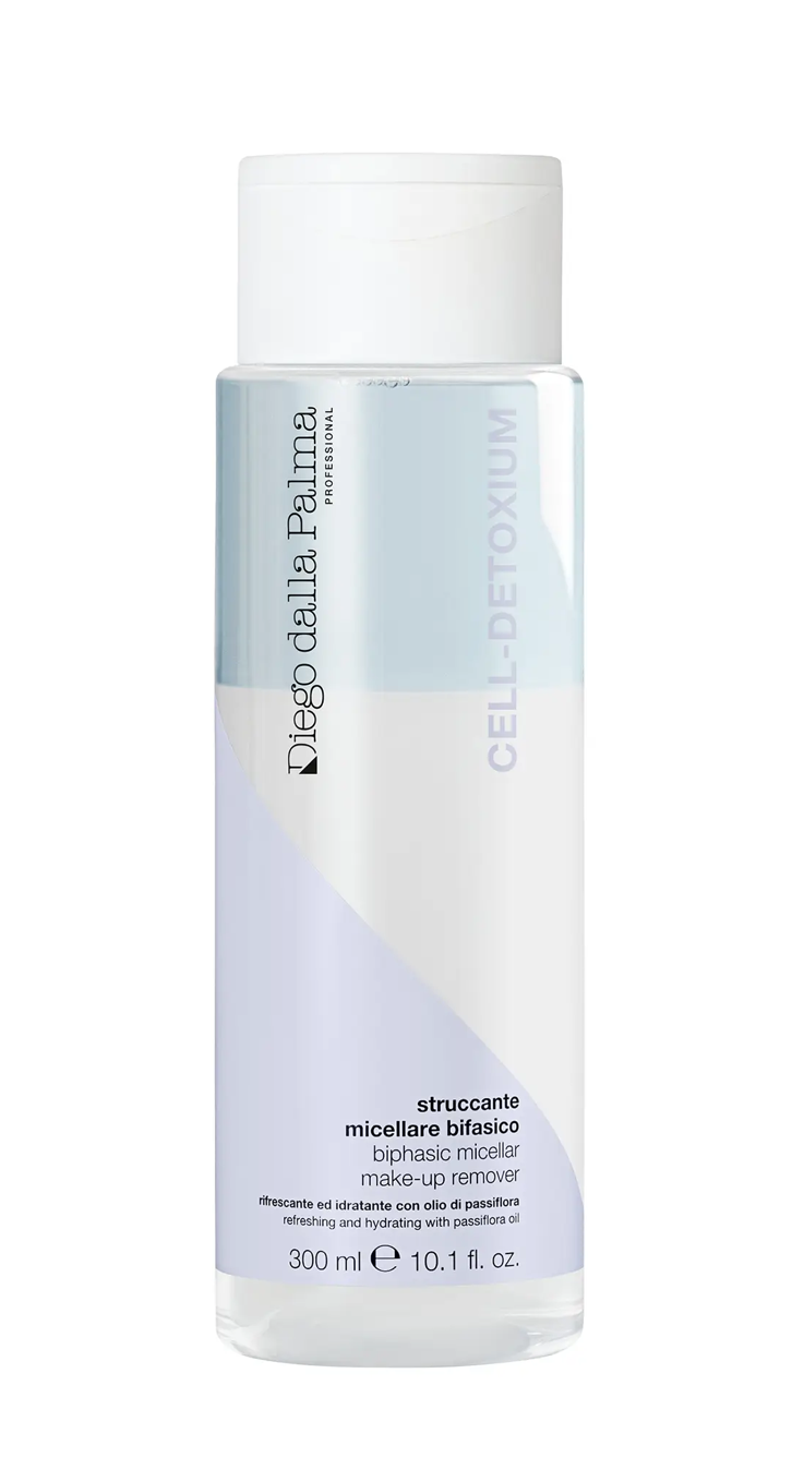 A 300 ml bottle of Diego della Palma Cell-Detoxium Make-up Remover, featuring a white cap and a white bottle with light blue and lavender graphic accents on a white background.